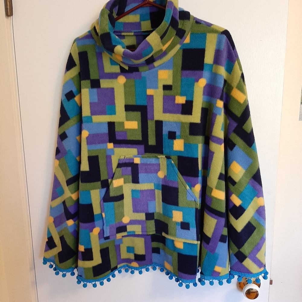 Handmade colorful poncho with pom pom trim